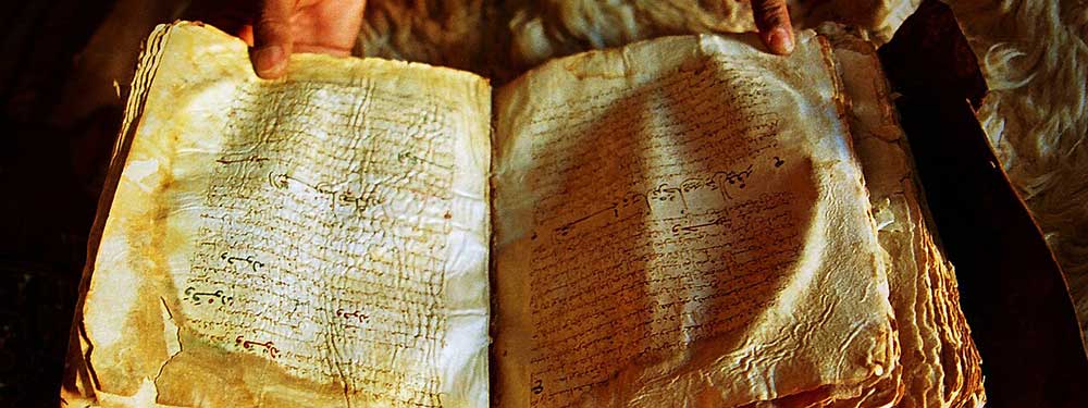 A nine-century-old Quran bound in gazelle skin in the library of Chinguetti, Mauritania, Africa